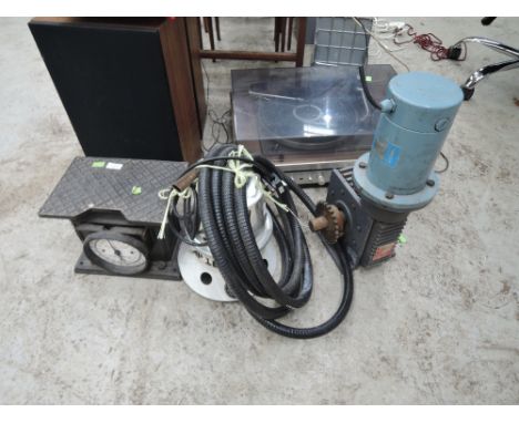 An electric motor, spraymaster and vintage luggage/personal scale