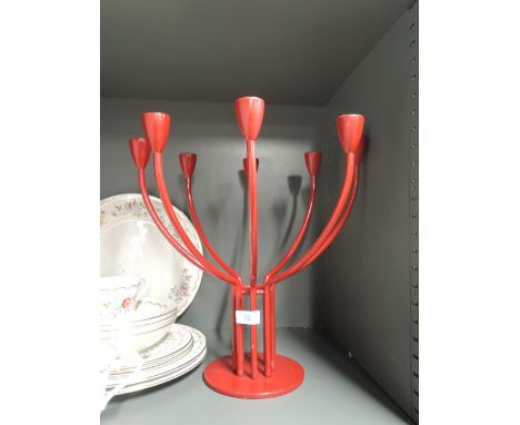 A vintage eight tier candle stick in red