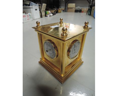 A vintage brass bodied four face clock barometer etc
