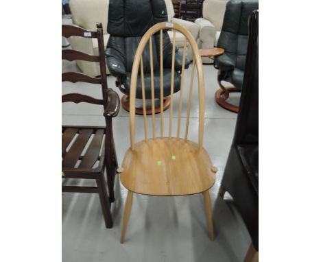 A light Ercol hoop and stick back kitchen chair 