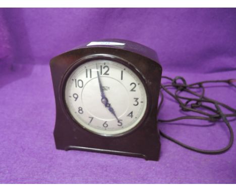 A vintage art deco design bakelite clock by Smiths