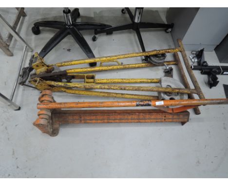 Two industrial tools, pipe bender etc