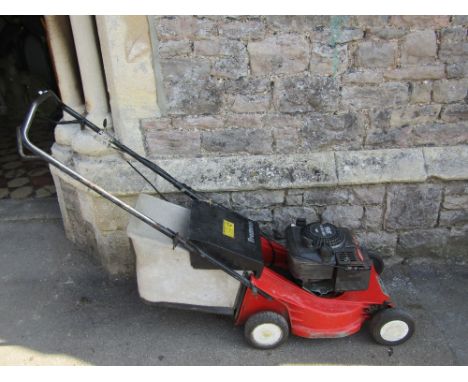 A Tromeca petrol driven rotary lawn mower, model TRT443, with Quantum XM35 engine