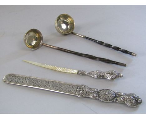 Attractive Eastern filigree silver page turner together with a further silver handled mother-of-pearl paper knife and two hor