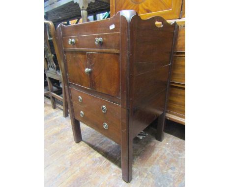 A Georgian mahogany tray top commode, enclosed by an arrangement of drawers and cupboards with chequered string inlay and sha