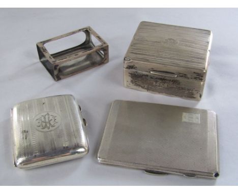 Two silver cigarette cases and silver match box holder, 10.5 oz approx; together with a further engine turned silver cigarett