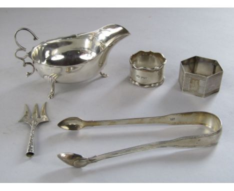 Mixed collection of silver to include a pair of antique silver sugar nips, a silver milk jug with double C scrolled handle, t