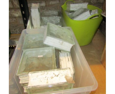 A quantity of reclaimed square moulded architectural glass bricks 