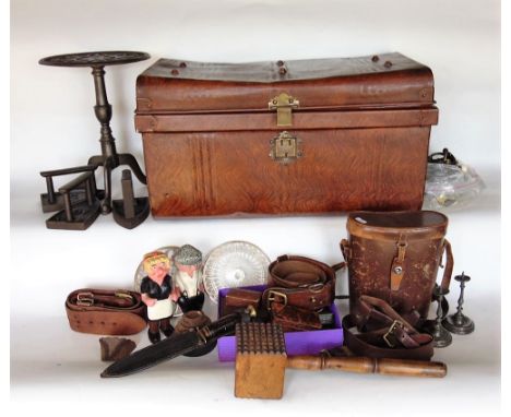 A collection of miscellaneous items to include a cast iron trivet and three irons; together with a tin trunk filled with vari