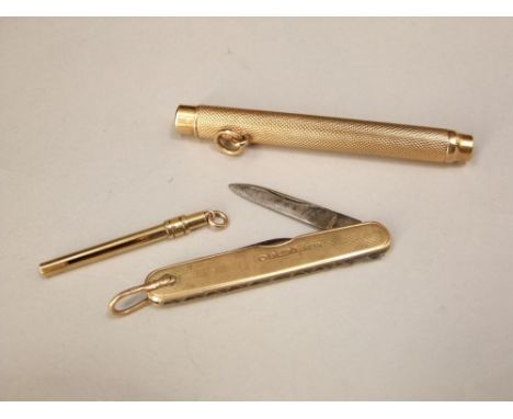 Three 9ct items to include an engine turned pencil, pocket knife and manicure tool (3)