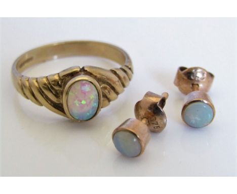 9ct opal set items comprising Celtic style ring, size P and a pair of stud earrings, 4g total