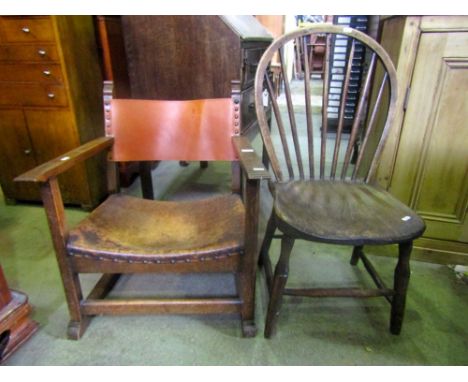 A 19th century Windsor hoop and stick back kitchen chair in elm and ash together with a low fireside chair with open arms, wo