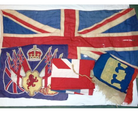 A collection of vintage flags to include two Union Jacks, a United Commonwealth flag and one other unknown flag (4)
