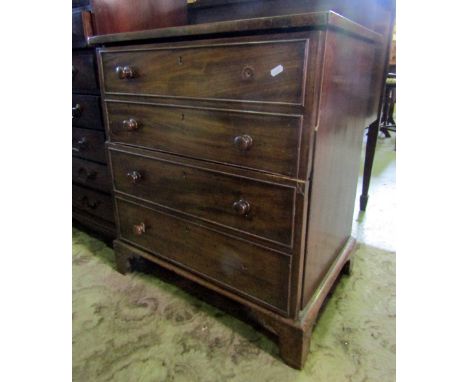 A small 19th century mahogany chest of two long deep drawers (disguised as four) raised on bracket supports, (converted commo