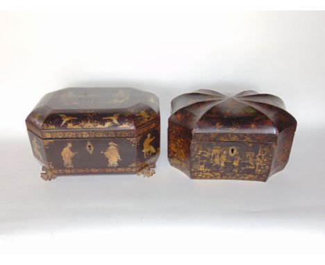 Japanese lacquered tea caddy, decorated with chinoiserie gilt detail, the hinged lid enclosing two lidded metal canisters upo