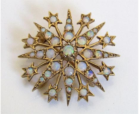 A 9ct opal starburst pendant/brooch, 5g