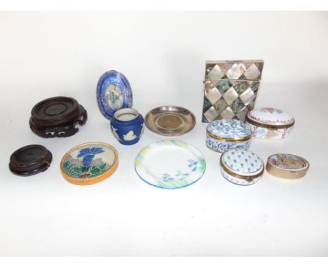 A collection of various trinket items to include six trinket/pill boxes, hard wood stand, a Danish type enamel frame, a mothe