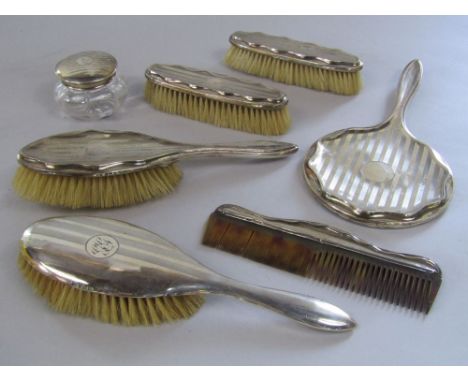 Early 20th century silver dressing set comprising set three brushes, a mirror and silver topped comb together with two furthe