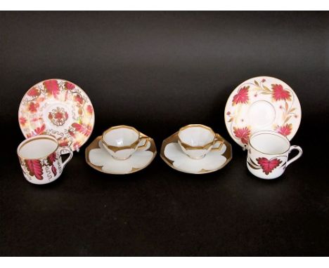 Tiffany & Co of New York Grosvenor pair of coffee cans and saucers, with pink floral sprays and gilt highlights; together wit