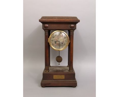 Oak cased portico mantle clock, with two train silvered drum head movement, 41cm high