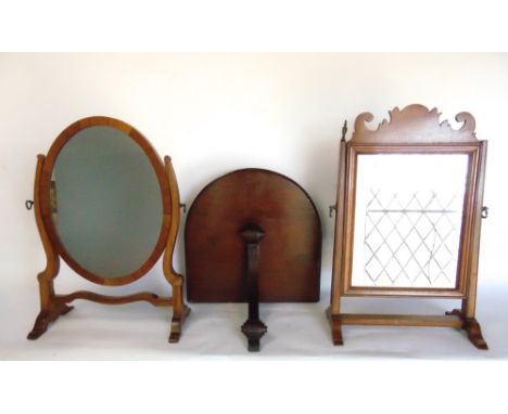 Two 19th century swing mirrors together with a carved mahogany wall bracket with scrolled detail (3)