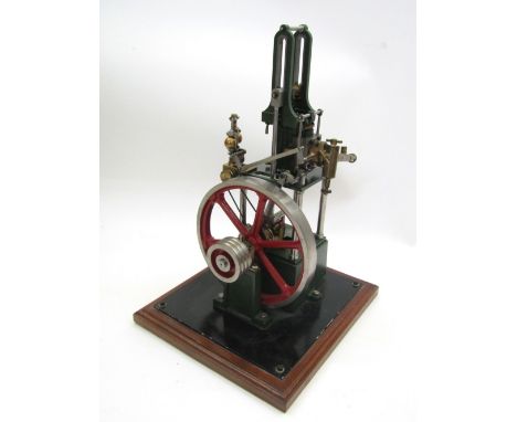 A Stuart Turner - James Coombes table engine, 17.5cm flywheel, 36cm in height with booklet by Andrew Smith, together with wor