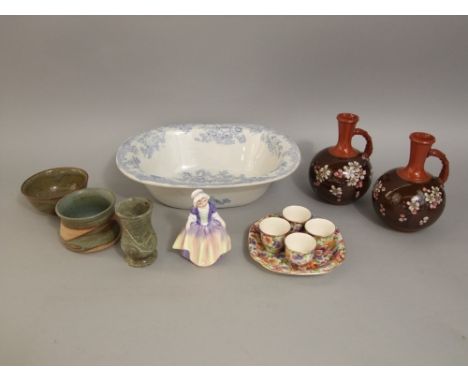 A Royal Doulton figure of Dinky Do HN1678, together with a pair of early 20th century ewers in the Doulton manner with painte