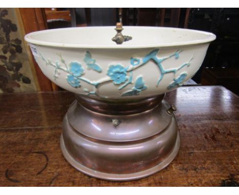 An unusual late 19th century table top drinking/water fountain, the ceramic bowl with moulded dragonfly, butterfly, blossom a