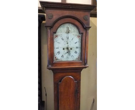 A Georgian oak longcase clock, the hood with simple column supports and applied cast brass detail, enclosing a broken arch pa