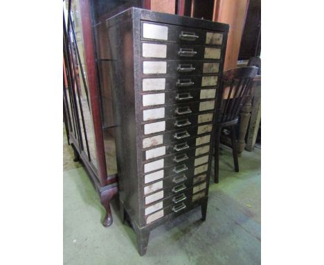 A vintage stor steel floor standing filing cabinet fitted with fifteen shallow index filing drawers, approx 42cm wide x 100cm