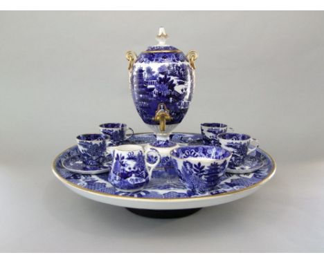 An unusual 19th century Copeland blue and white printed willow pattern Lazy Susan part coffee set comprising a circular revol