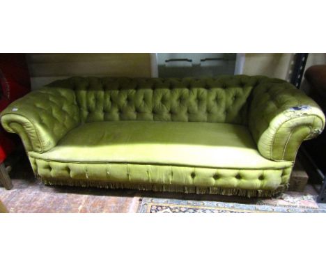 A 19th century Chesterfield sofa, with buttoned fabric and fringed borders, 2m wide