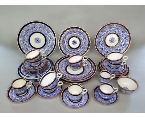 A collection of Royal Worcester Lily pattern wares including sugar bowl, twelve cups (three shapes) twelve saucers (two sizes