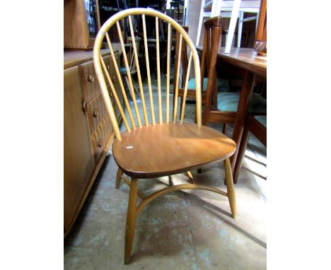 An unusual broad Ercol light elm Windsor dining chair, 92cm high