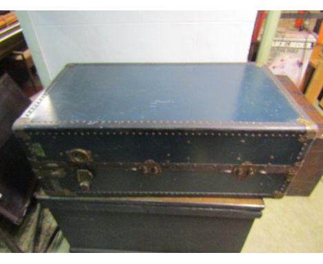 A vintage Victor wardrobe trunk with partially fitted interior