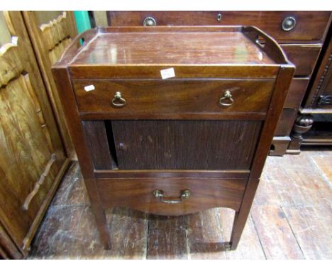 A Georgian mahogany tray top commode, the front elevation enclosed by a frieze drawer, tambour panel and pullout, on square t