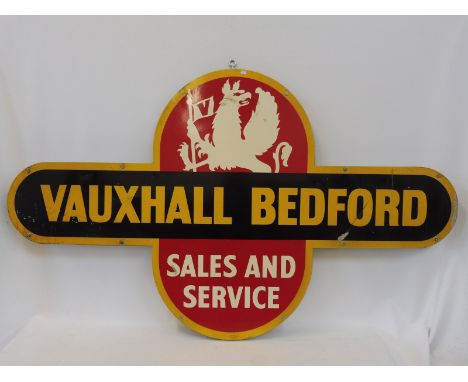 An unusual Vauxhall Bedford Sales and Service shaped aluminium advertising sign mounted on board, by Cowling, dated February 