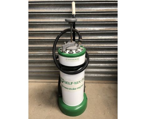 A BP Self-Mixer 2-stroke oil dispenser.