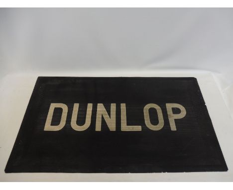 A Dunlop rectangular rubber floor mat, 36 1/4 x 20 1/2".