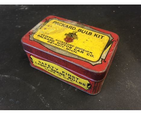 A rare Packard Motor Car Company branded bulb kit tin with partial contents.