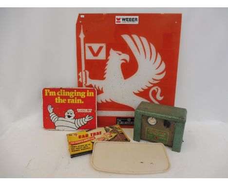 A quantity of motoring collectables to include a Vauxhall griffin perspex sign, a boxed North West Plastics Ltd. car tray etc