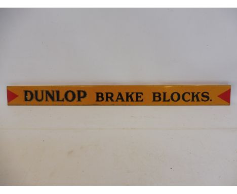 A Dunlop Brake Blocks shelf strip, in good condition.