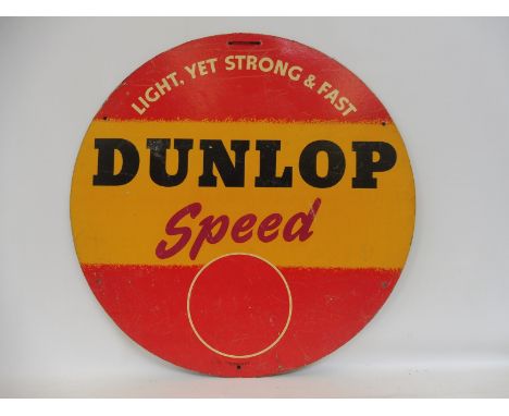 A Dunlop Speed circular cardboard tyre insert advertisement, 24" diameter.