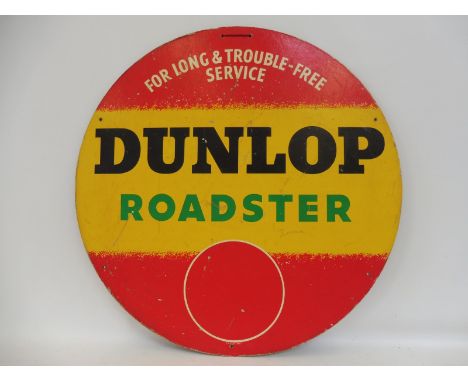 A Dunlop Roadster circular cardboard tyre insert advertisement, 24" diameter.
