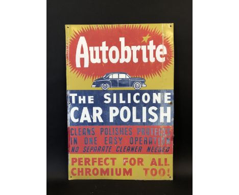 An Autobrite Silicone Car Polish part pictorial tin advertising sign, 19 3/4 x 29".