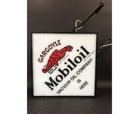 A large lozenge shaped double sided lightbox with panels advertising Mobiloil, the panels thought to be replacements, 33 1/2"