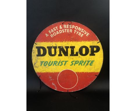 A Dunlop Tourist Sprite circular cardboard tyre insert advertising sign dated 1951, 24" diameter.