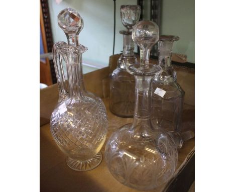 A large pair of 19th century decanters with stoppers, two globe &amp; shaft decanters and a claret jug