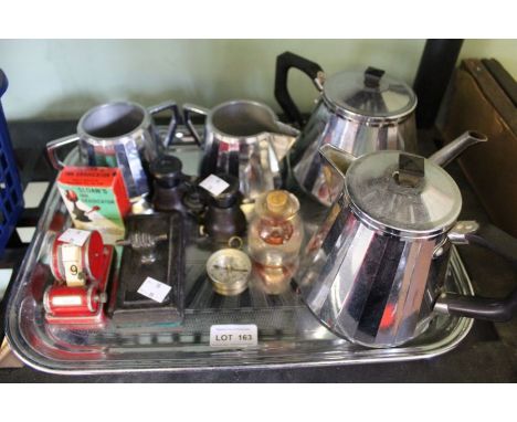 A plated tea set on tray, date indicator for desk, fist paperweight, compass inkwell, opera glasses and "Ink Eradicator" in t