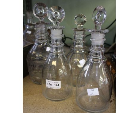 A pair of plain Georgian design ring neck decanters and two others